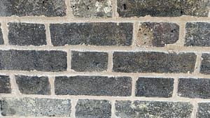 Close up of lime pointing on an oast house in Rochester, a flush finish