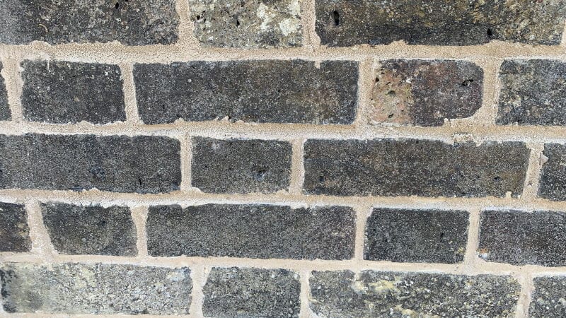 Close up of lime pointing on an oast house in Rochester, a flush finish
