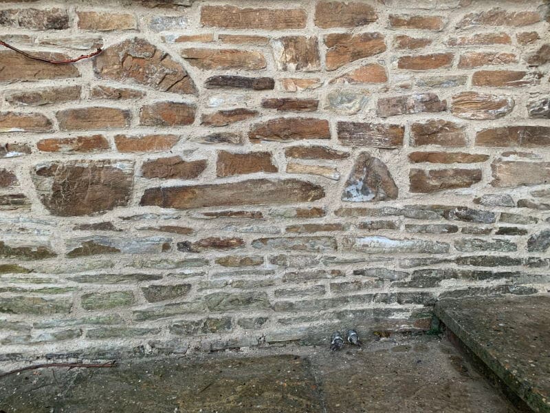 This Sandstone building in Faversham had cement pointing that was causing damage. We replaced it with a breathable lime mortar.